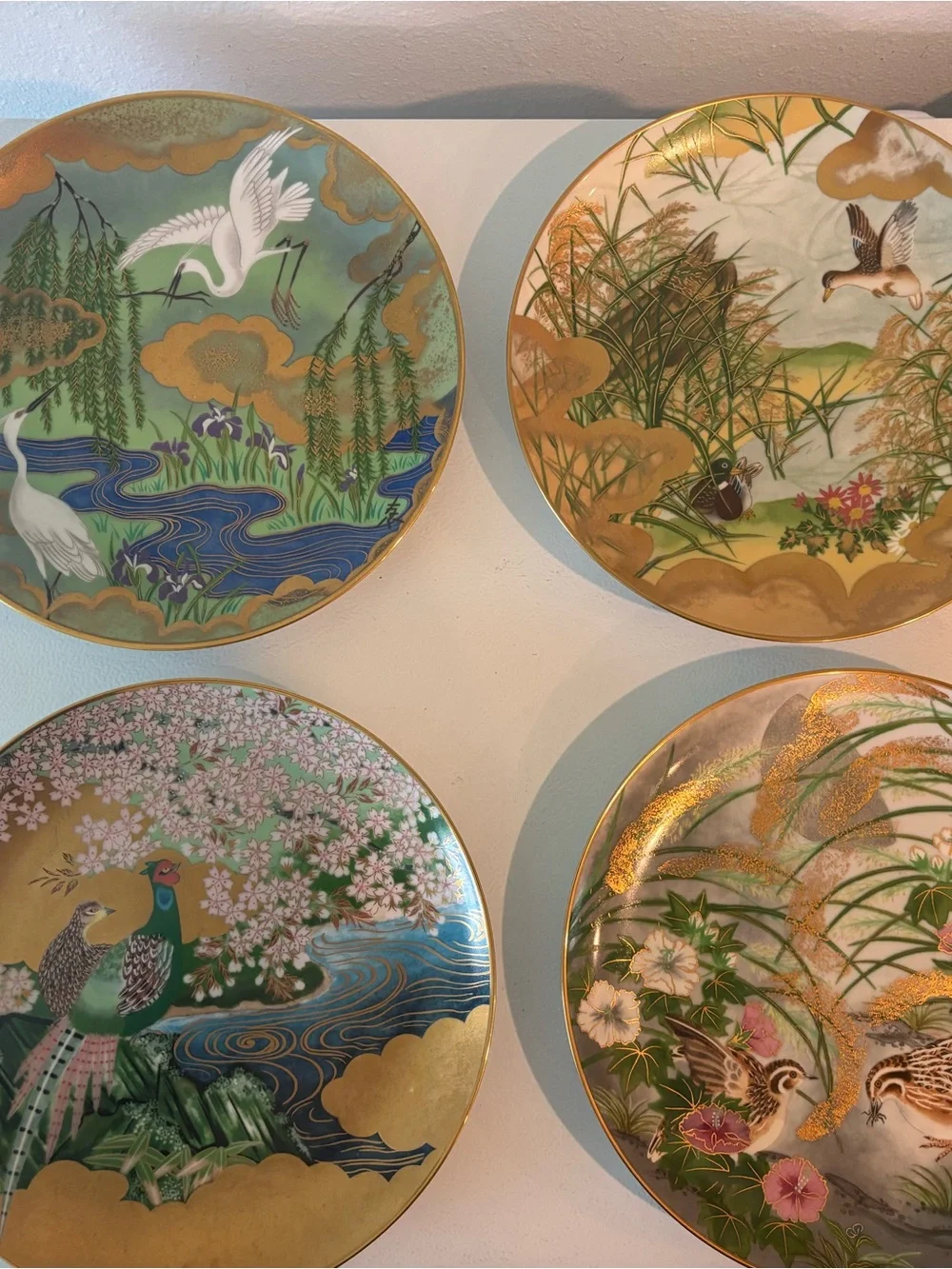 Set of Decorative Porcelain Dinnerware Plates with Green and Gold Bird Motifs